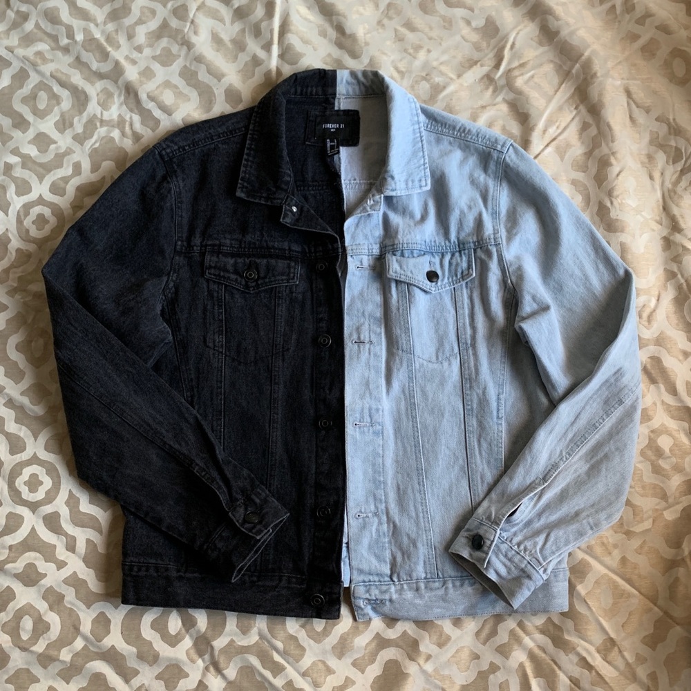 Jean jacket, half blue denim and half black denim.